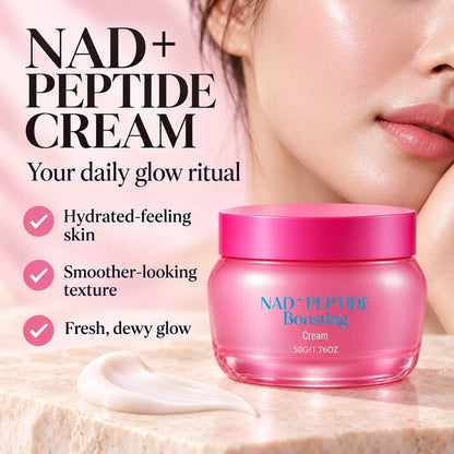 Pink NAD+ Peptide Boosting Cream jar beside a cream swatch and a woman’s dewy cheek, highlighting hydrated-feeling skin, smoother-looking texture, and a fresh glow.